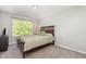 This bedroom features natural light, carpet and neutral paint at 1101 Washhouse Ln, Wake Forest, NC 27587