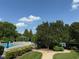 Manicured lawns, pool, tennis courts, cabana and walking paths highlight community features at 1101 Washhouse Ln, Wake Forest, NC 27587