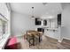 Charming dining area featuring a rustic table and chairs, alongside bright windows at 1101 Washhouse Ln, Wake Forest, NC 27587