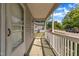 Covered porch provides a comfortable outdoor space with street views and protection from the elements at 1112 Mark St, Raleigh, NC 27601