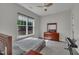 Cozy bedroom offers neutral tones, carpet flooring, and natural light, creating a tranquil space at 112 Serenata Dr, Holly Springs, NC 27540