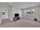 Spacious bonus room with carpet, natural light, and a view of the windows at 112 Serenata Dr, Holly Springs, NC 27540