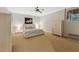 Spacious bedroom with neutral carpet, ample natural light, and closet storage at 11470 Club Dr, Chapel Hill, NC 27517