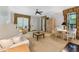 Cozy living room with neutral tones, plush seating, stylish decor, and ample natural light at 11470 Club Dr, Chapel Hill, NC 27517