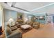 Open-concept living space with comfortable seating, a wet bar, and an inviting layout at 11470 Club Dr, Chapel Hill, NC 27517