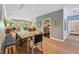 Dining area featuring view to living room with sliding glass doors at 11470 Club Dr, Chapel Hill, NC 27517