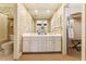 Bathroom featuring a double vanity, a toilet, and a shower/tub combination at 11475 Club Dr, Chapel Hill, NC 27517