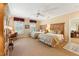 Spacious bedroom with dual beds, an office space, and seamless access to other rooms at 11475 Club Dr, Chapel Hill, NC 27517