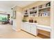 Built-in shelving and storage in this expansive dining and living space at 11475 Club Dr, Chapel Hill, NC 27517