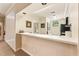Open-concept kitchen space with a serving counter and direct access to living and dining areas at 11475 Club Dr, Chapel Hill, NC 27517