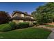Charming home with well-maintained landscaping, set against a picturesque twilight backdrop at 11477 Club Dr, Chapel Hill, NC 27517