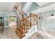 Foyer with a staircase leading to the upper level and tile flooring at 11477 Club Dr, Chapel Hill, NC 27517