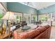 Open living area with a cozy seating arrangement and natural light at 11477 Club Dr, Chapel Hill, NC 27517