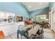 Open living area with dining, kitchen, and multiple seating areas at 11477 Club Dr, Chapel Hill, NC 27517