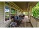 Spacious porch with comfortable seating, perfect for enjoying the outdoors at 11477 Club Dr, Chapel Hill, NC 27517
