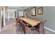Dining room features a large wooden table and chairs, perfect for gatherings at 11483 Club Dr, Chapel Hill, NC 27517