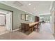 Spacious dining room with large table and chairs, great for entertaining guests at 11483 Club Dr, Chapel Hill, NC 27517