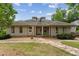 Charming one story home with dormers, stone walkway and well-manicured lawn at 11483 Club Dr, Chapel Hill, NC 27517