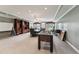 Spacious game room with foosball table, large conference table and ample lighting at 11483 Club Dr, Chapel Hill, NC 27517