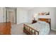 Bedroom featuring carpeted floors, a window, and artwork on the walls at 11916 Deneb Ct, Raleigh, NC 27614