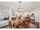 Inviting dining room seamlessly connects to the living room and kitchen, perfect for gatherings at 11916 Deneb Ct, Raleigh, NC 27614