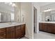 Spacious bathroom with double sinks, granite countertops, and a tiled floor at 12 Beacon Ridge Blvd, Chapel Hill, NC 27516