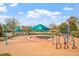 A community pool area with splash pad and shaded areas at 12 Beacon Ridge Blvd, Chapel Hill, NC 27516