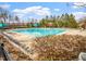 Large community pool area with shaded lounge seating at 12 Beacon Ridge Blvd, Chapel Hill, NC 27516