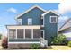 Beautiful two-story home featuring a screened porch and manicured lawn at 12 Beacon Ridge Blvd, Chapel Hill, NC 27516