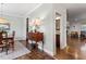 Open hallway connecting dining room and living room at 12 Beacon Ridge Blvd, Chapel Hill, NC 27516