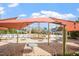 A community patio area featuring shade sails and outdoor dining at 12 Beacon Ridge Blvd, Chapel Hill, NC 27516
