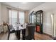 Dining room with modern table set, chairs, and window at 12404 Huntley Chase Dr, Durham, NC 27703
