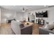 Upstairs living room with open floor plan, TV, and plenty of seating at 12404 Huntley Chase Dr, Durham, NC 27703