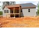The home has a charming back porch, perfect for enjoying peaceful outdoor moments at 125 Purslane Dr, Franklinton, NC 27525