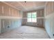A serene bedroom with drywall, natural light, and an inviting space at 125 Purslane Dr, Franklinton, NC 27525