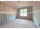 A serene bedroom with drywall, natural light, and an inviting space at 125 Purslane Dr, Franklinton, NC 27525
