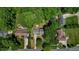 Overhead view of the home with mature trees, private backyard, and well-maintained landscaping at 1274 Candlewood Dr, Elon, NC 27244