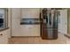 Traditional kitchen with white cabinets and stainless steel refrigerator at 1274 Candlewood Dr, Elon, NC 27244