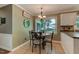 Cozy kitchen nook features a round table and seating with natural light at 1274 Candlewood Dr, Elon, NC 27244