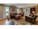 Comfortable living room with classic furnishings, hardwood floors, and cozy decor at 1274 Candlewood Dr, Elon, NC 27244