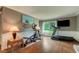 Bright living room showcasing exercise equipment and nice view to the outside at 1274 Candlewood Dr, Elon, NC 27244