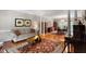 Elegant living room featuring hardwood floors, refined furnishings, and an inviting ambiance at 1312 Glenden Falls Way, Raleigh, NC 27614