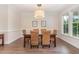 Bright dining room featuring hardwood floors, natural light, and seating for six at 1344 Legend Oaks Drive Dr, Chapel Hill, NC 27517