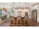 Bright kitchen with island, stainless steel appliances, and hardwood floors at 1344 Legend Oaks Drive Dr, Chapel Hill, NC 27517