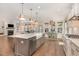 Spacious kitchen flows to eating area and living room with hardwood flooring at 1344 Legend Oaks Drive Dr, Chapel Hill, NC 27517
