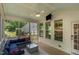 Relaxing screened porch with outdoor seating and ceiling fan at 1344 Legend Oaks Drive Dr, Chapel Hill, NC 27517