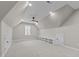 Spacious bonus room featuring built-in shelving and a large window with natural light at 1430 Clifton Pond Rd, Louisburg, NC 27549