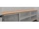 White shelving unit featuring a light wood countertop and marble tile backsplash at 1430 Clifton Pond Rd, Louisburg, NC 27549