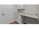 Office space features modern cabinetry, sleek countertops, and a built-in desk at 1430 Clifton Pond Rd, Louisburg, NC 27549