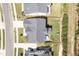 Aerial view displays backyard, play set, swimming pool, and surrounding green space at 155 Annabelle Branch Ln, Apex, NC 27523